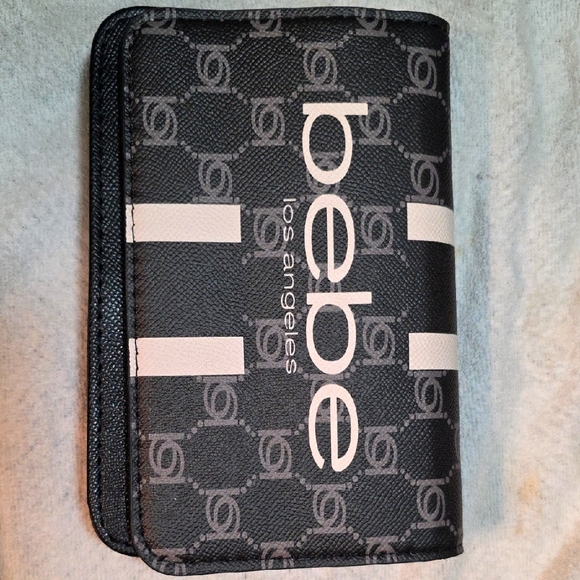bebe Handbags - Bebe Black and White Small Cross Body